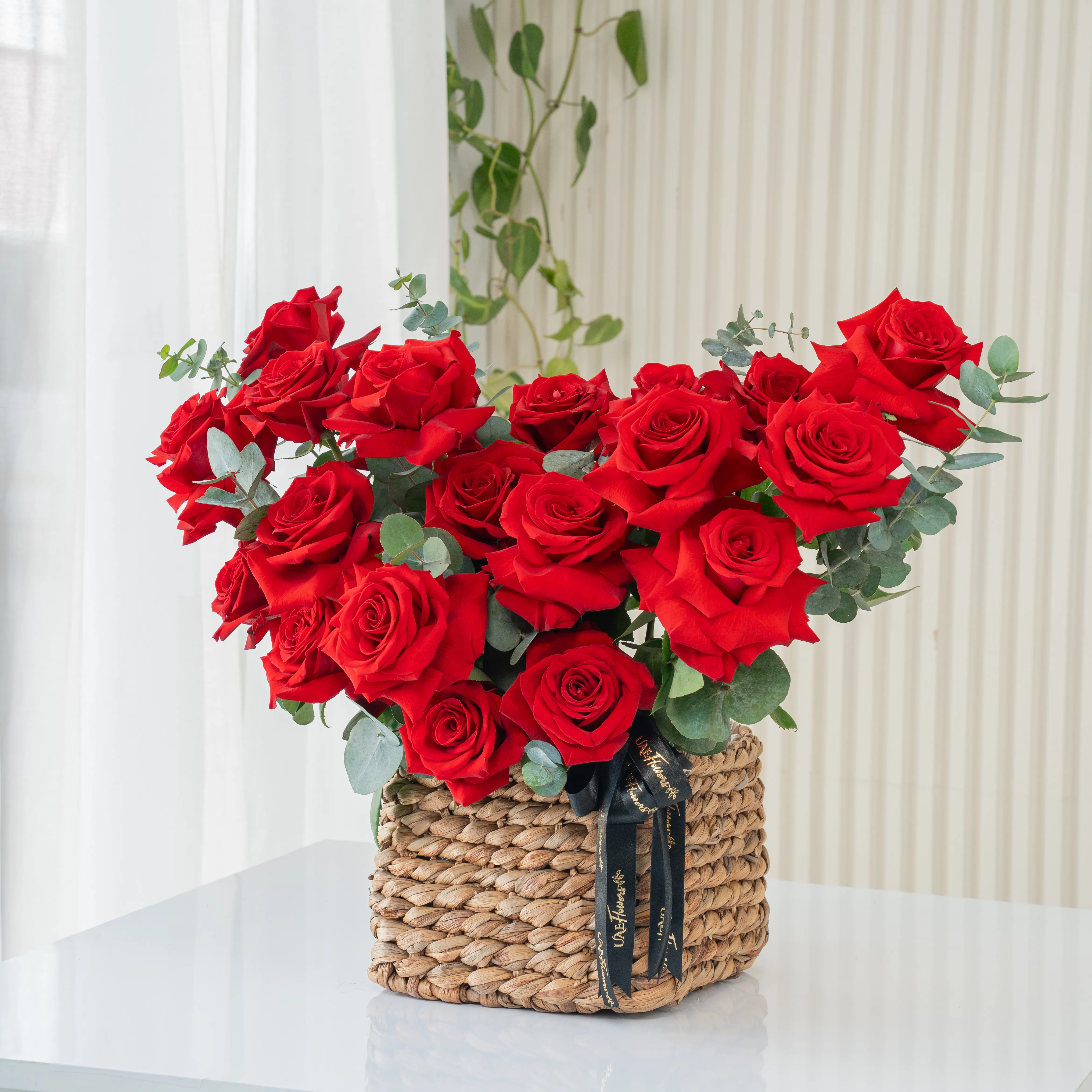 20 Opened Red Roses in a Basket with Fillers