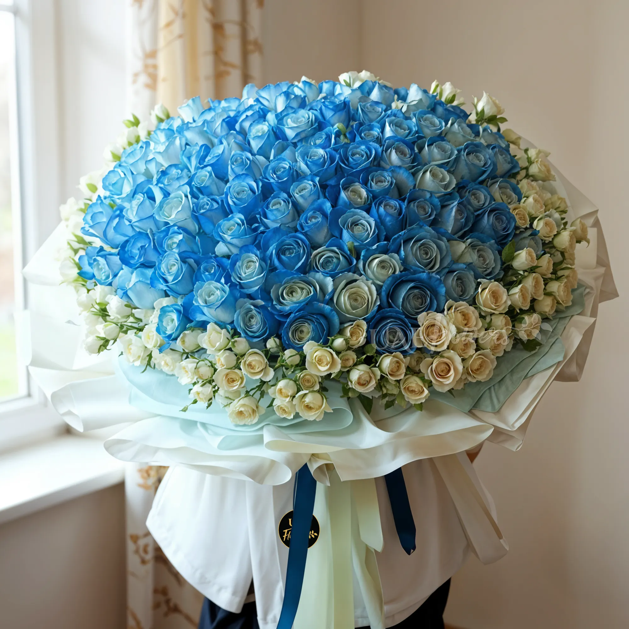 100 blue roses with 50 white spray roses and fillers
