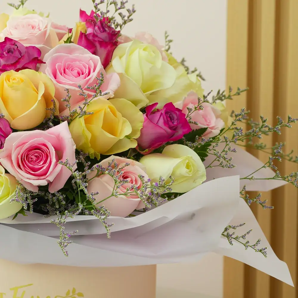 box of 30 roses in purple, pink, peach and white shades