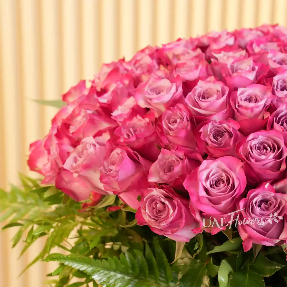 100 Stunning Purple Roses Vase