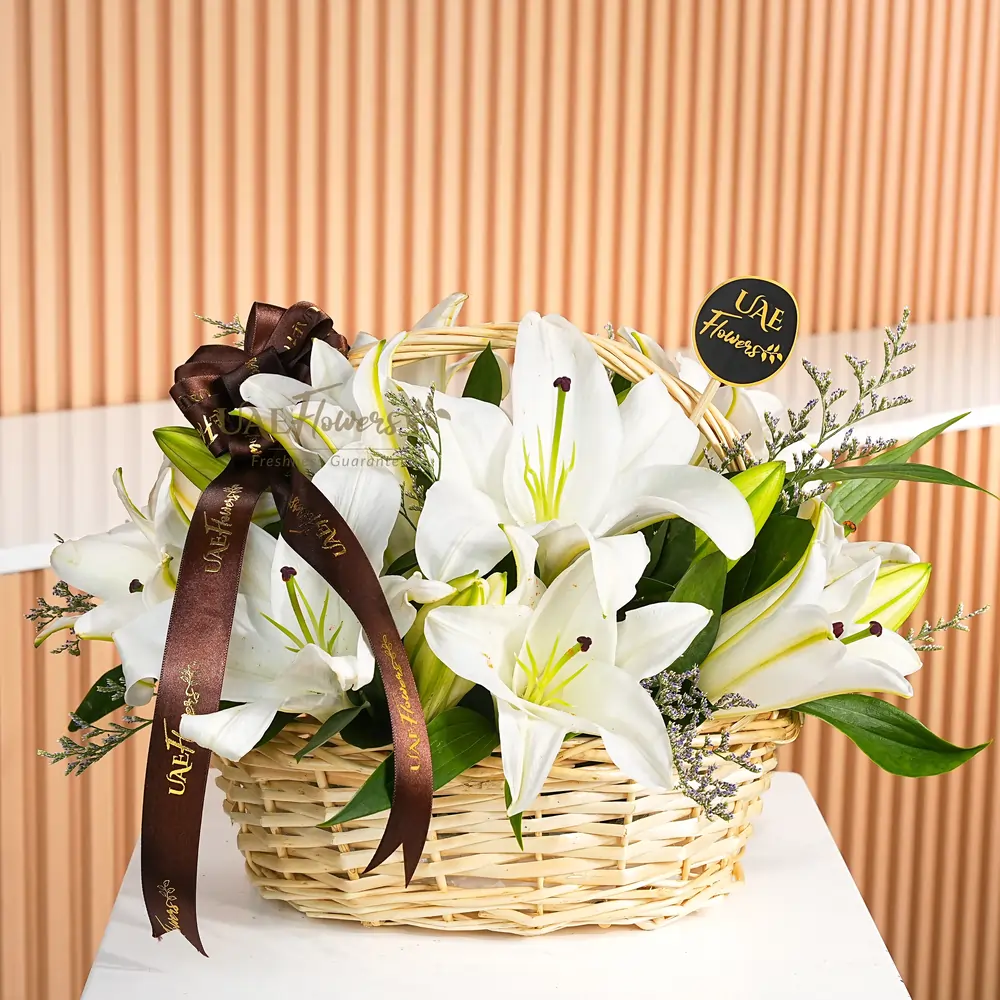 5 white lilies and limonium fillers